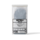 Packaged coffee from Edge Tea & Coffee with 'Guatemala Santa Elisa' on a white background